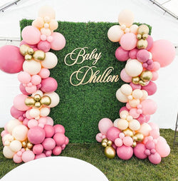 Baby shower girl themed with grass backdrop