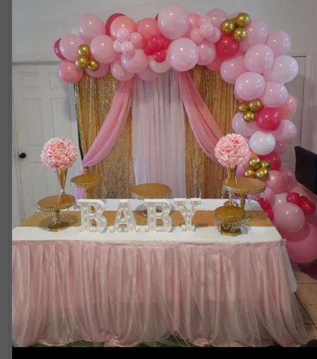 Fancy set up with pink and gold curtains